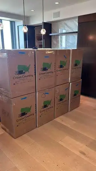 Packed moving boxes prepared by long distance movers for interstate relocation