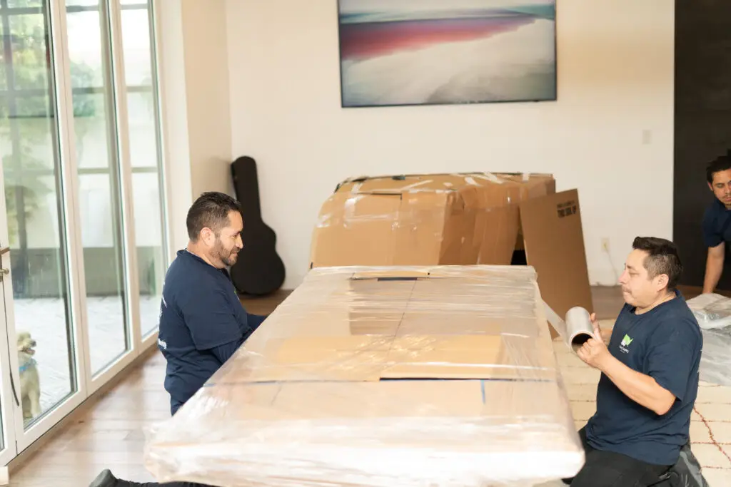 San Francisco long distance movers wrapping and protecting furniture for an interstate move